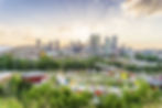 City of Calgary stampede ground with tipis and saddledome hockey arena on the left side of the picture 
