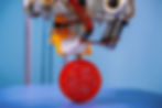 3D printer printing plastic ball.