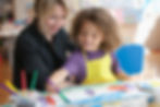 Thumbnail: A curly kid with an art instructor learning art