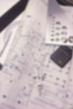 Blue print with compass and other geometry instrument