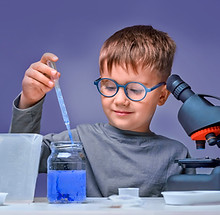 Child with Microscope